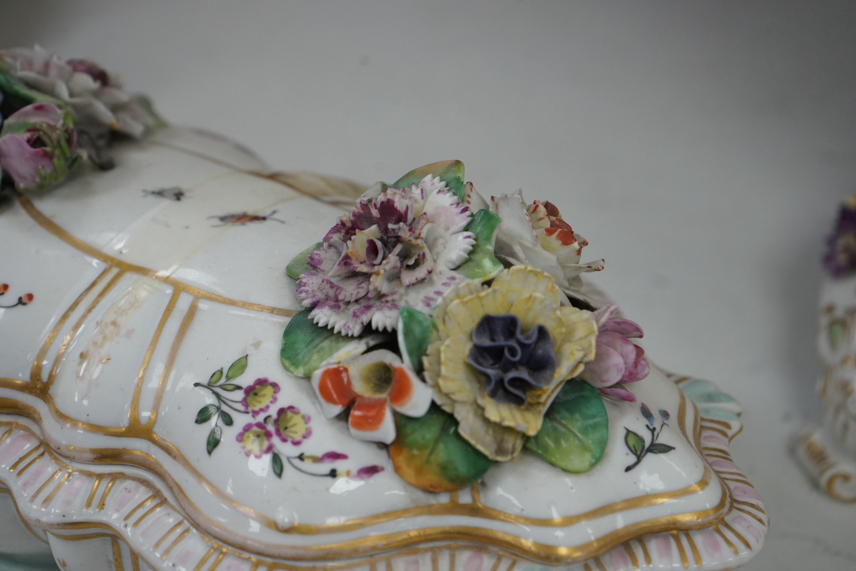 A Dresden floral encrusted porcelain incense burner hand painted with figures annd flowers, together with a similar lidded box, largest 52cm high. Condition - some losses